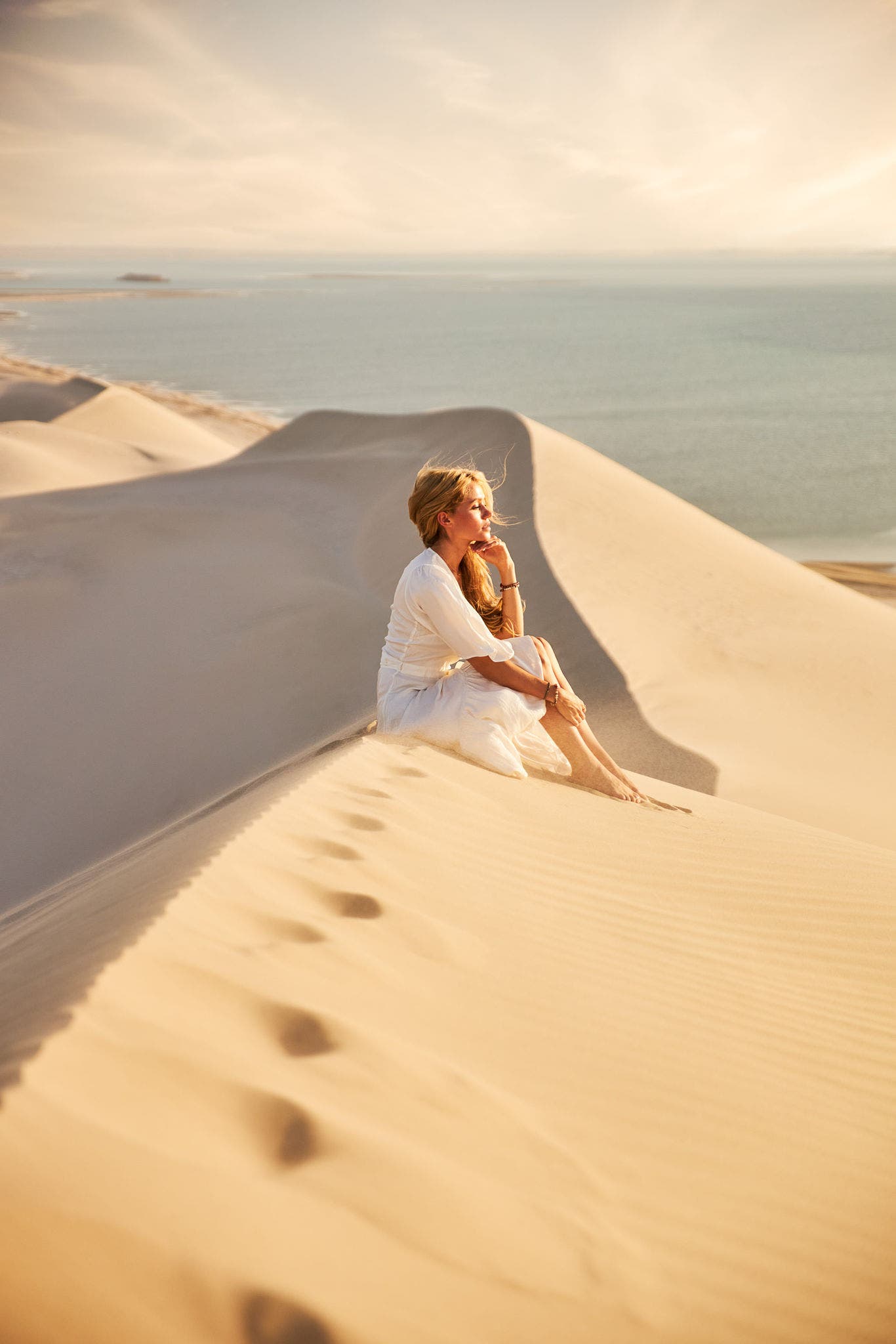 Machen Sie sich mit dem Strand Khor Al Adaid Beach vertraut.